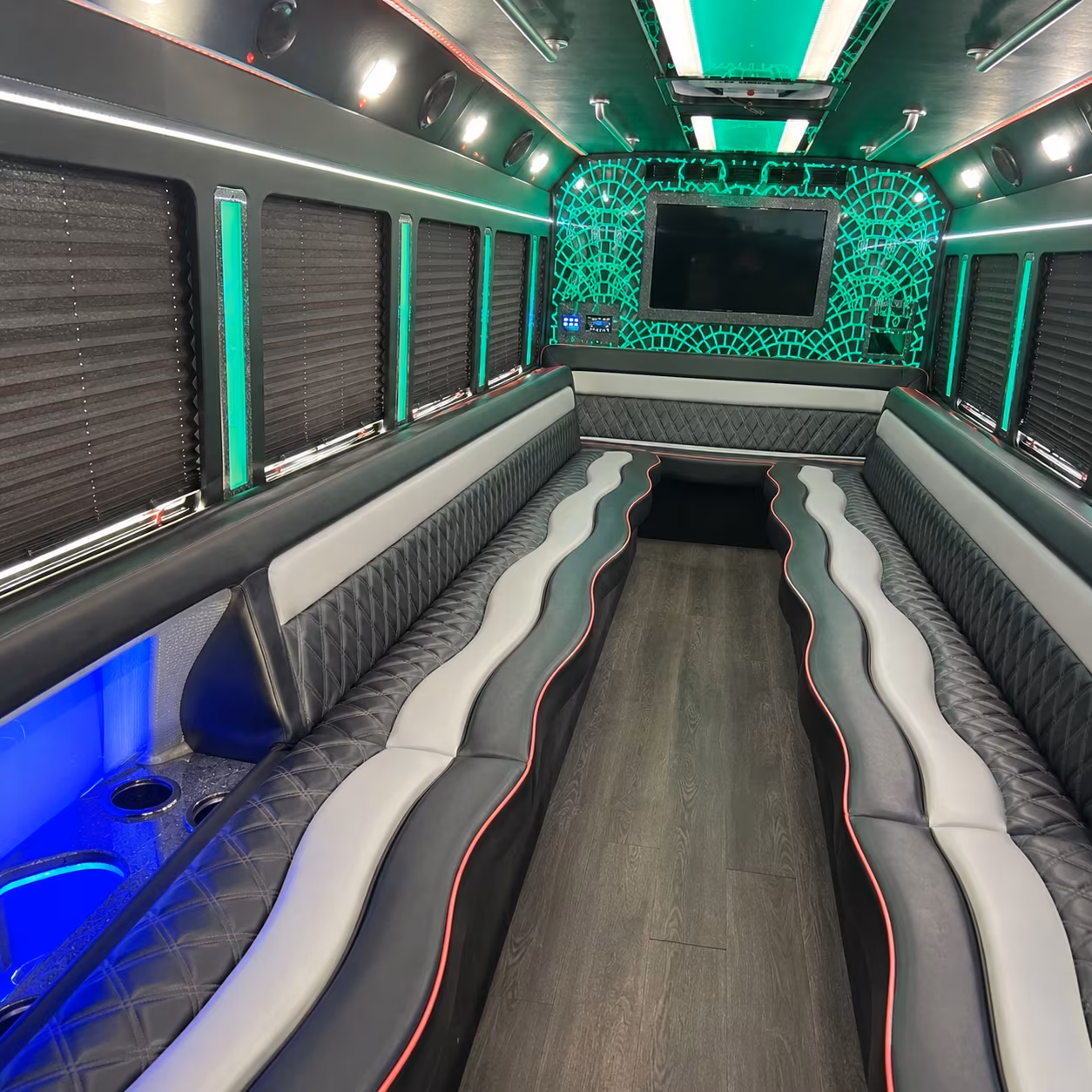 Group beside a Mercedes Sprinter limo in Orlando